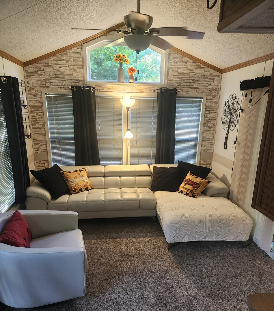 24-65 Woodhaven Lakes Sublette, IL 61367 - Photo 12 of 32 a living room with furniture and a window