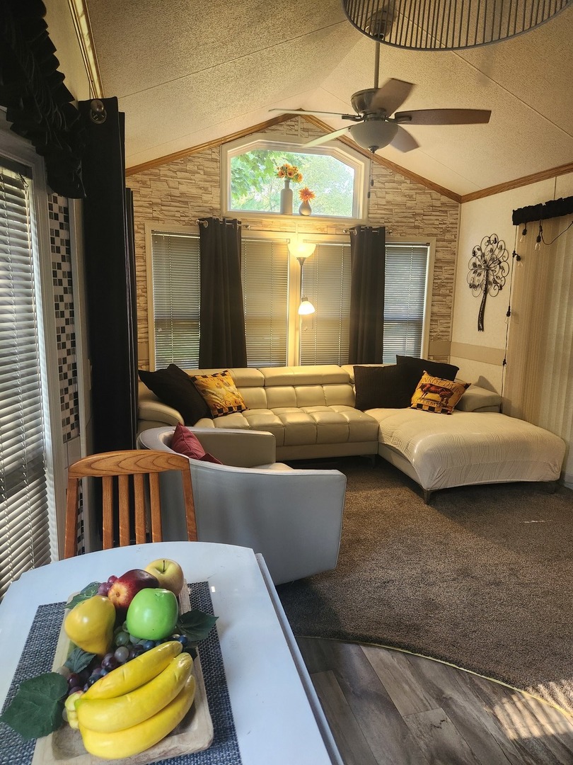 24-65 Woodhaven Lakes Sublette, IL 61367 - Photo 16 of 32 a living room with furniture and a table