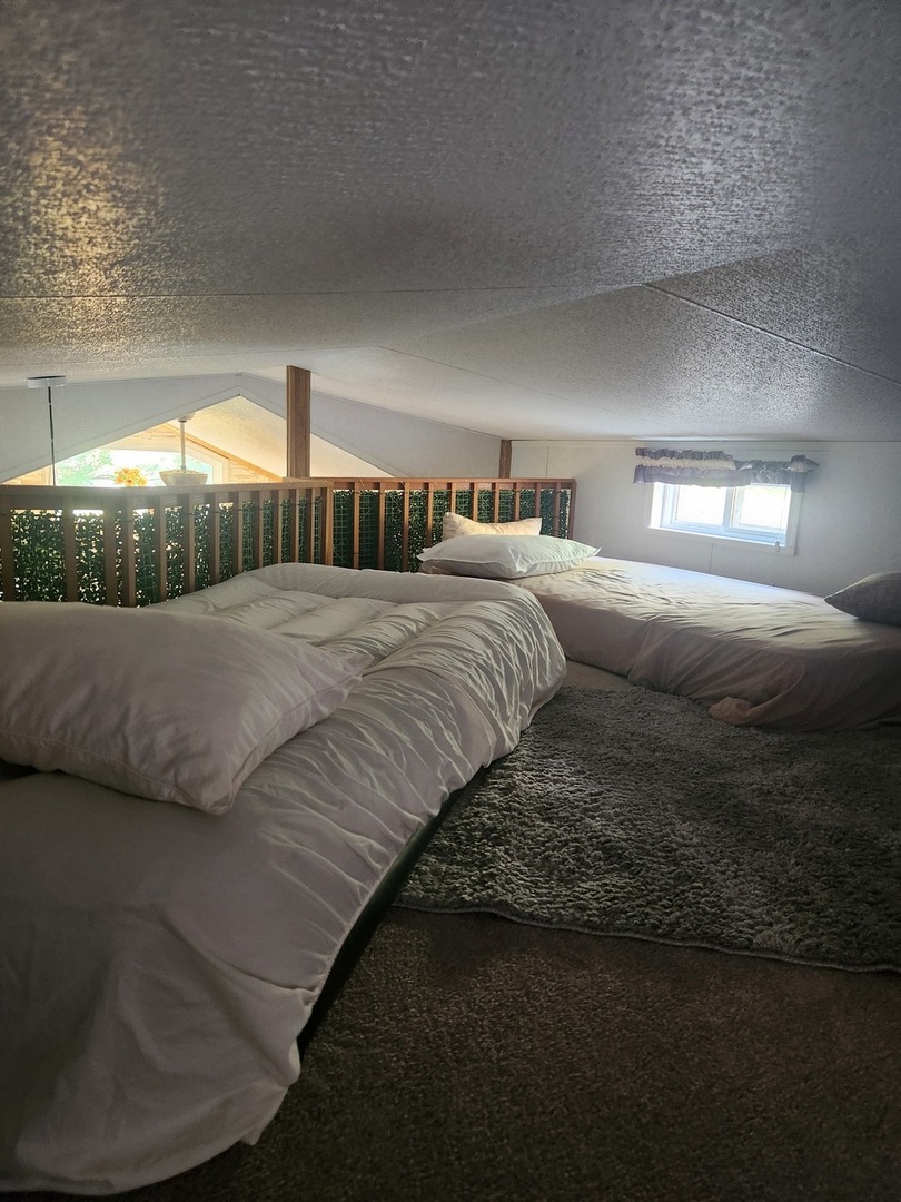 24-65 Woodhaven Lakes Sublette, IL 61367 - Photo 26 of 32 a bedroom with a bed and a night stand