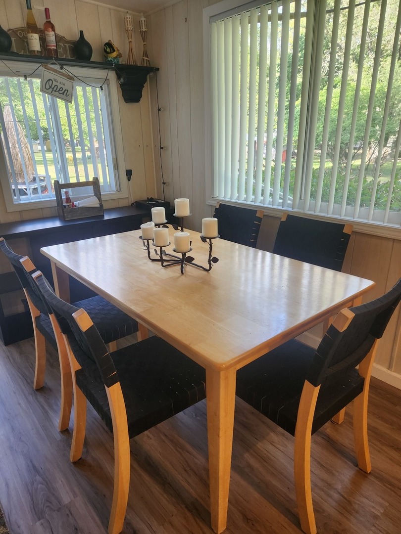 24-65 Woodhaven Lakes Sublette, IL 61367 - Photo 29 of 32 a view of a dining room with furniture and window