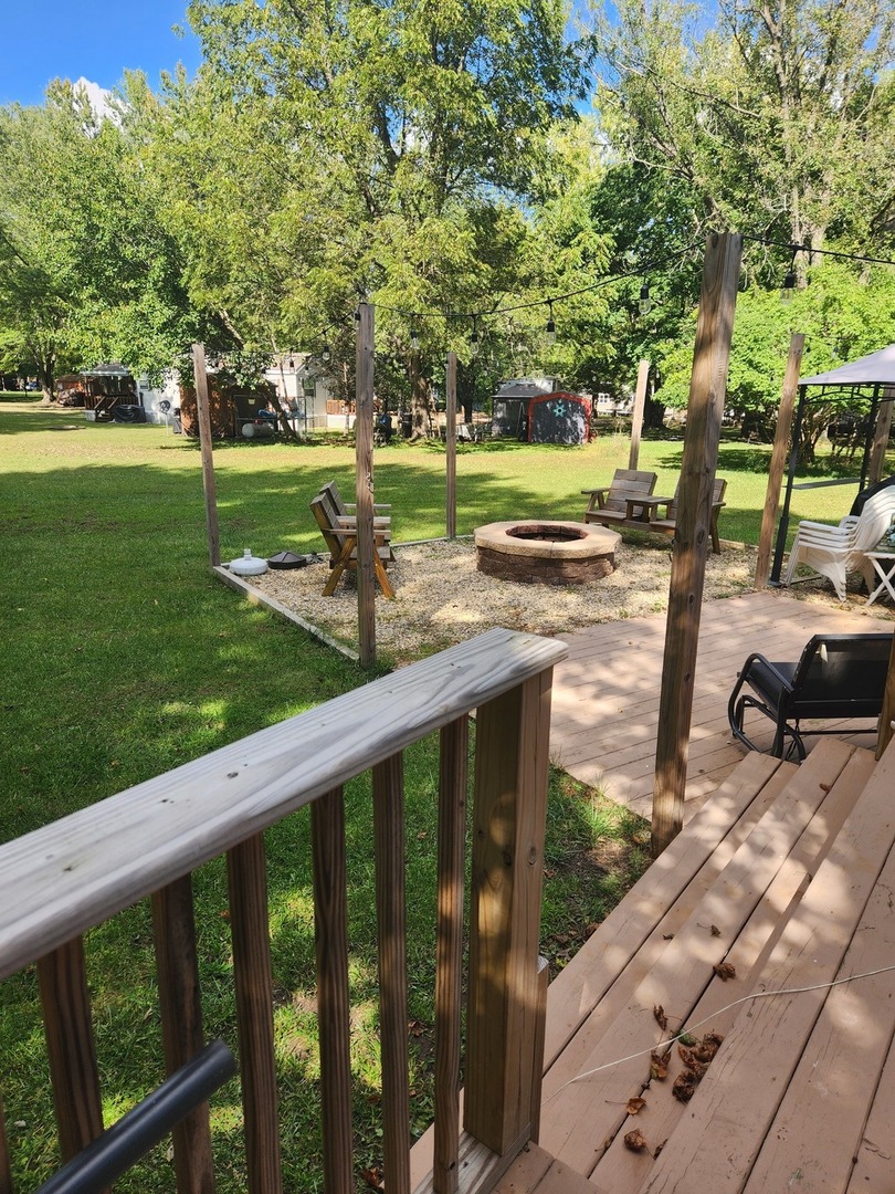 24-65 Woodhaven Lakes Sublette, IL 61367 - Photo 8 of 32 a view of a park with large trees