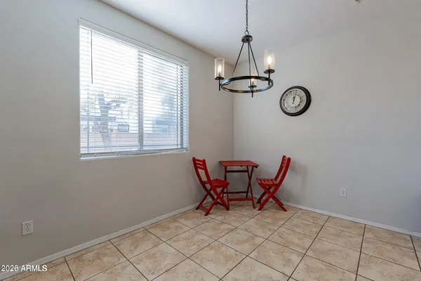 a view of a room with a table and a window