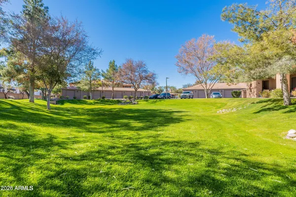 a view of a house with a big yard