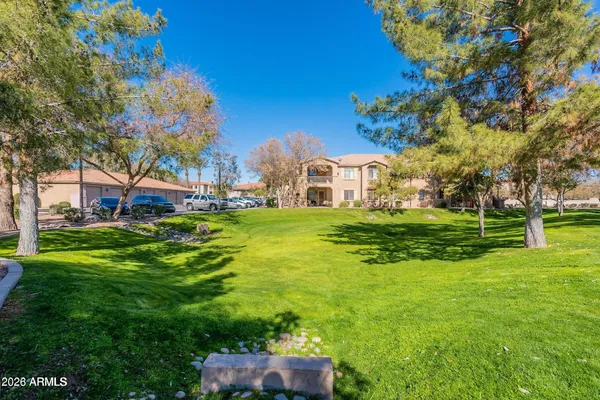 a view of a lake with a building in the background