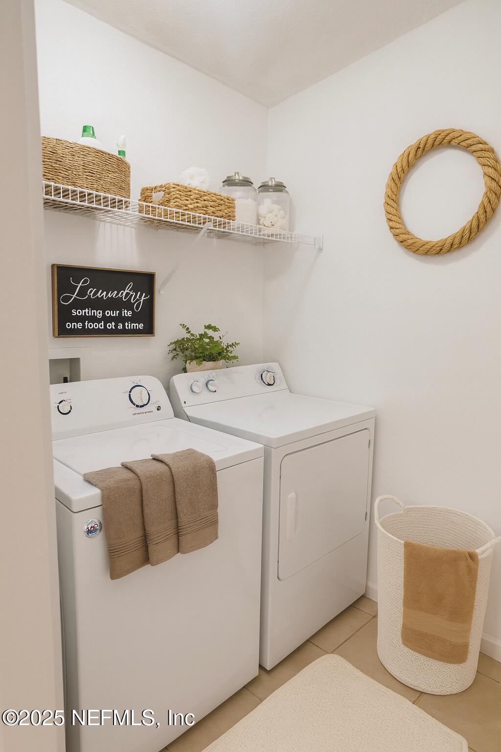 8550 Touchton Road, Unit 922 Jacksonville, FL 32216 - Photo 16 of 41 a utility room with dryer and washer