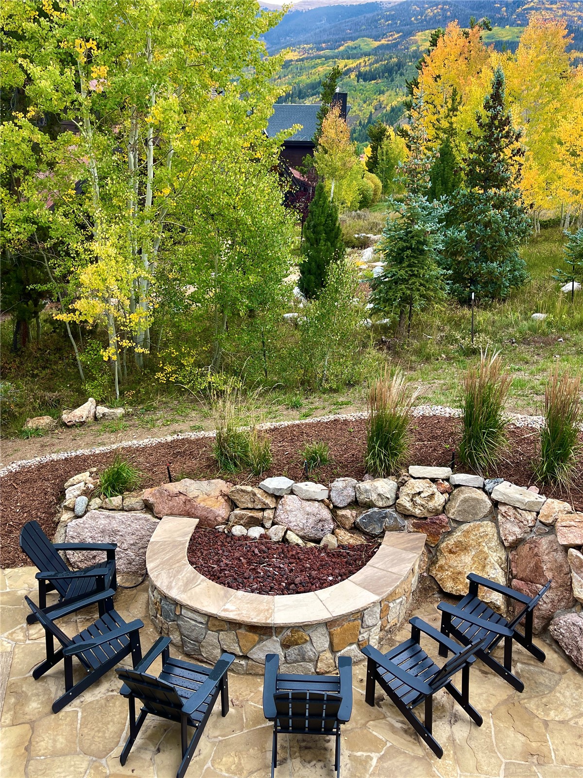 230 Game Trail Road Silverthorne, CO 80498 - Photo 42 of 43 a view of a backyard with sitting area