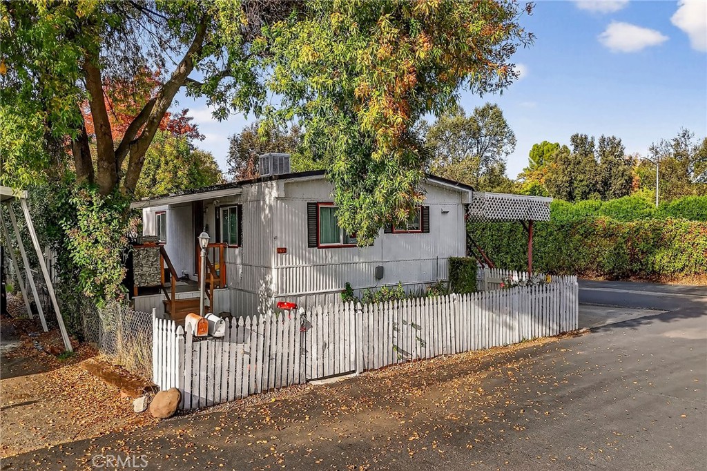 3156 Esplanade, Unit 292 Chico, CA 95973 - Photo 1 of 44 front view of a house with a small yard