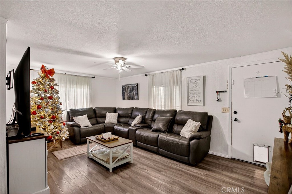 3156 Esplanade, Unit 292 Chico, CA 95973 - Photo 12 of 44 a living room with furniture and a large window