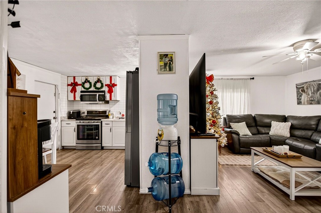 3156 Esplanade, Unit 292 Chico, CA 95973 - Photo 13 of 44 a living room with furniture and a flat screen tv