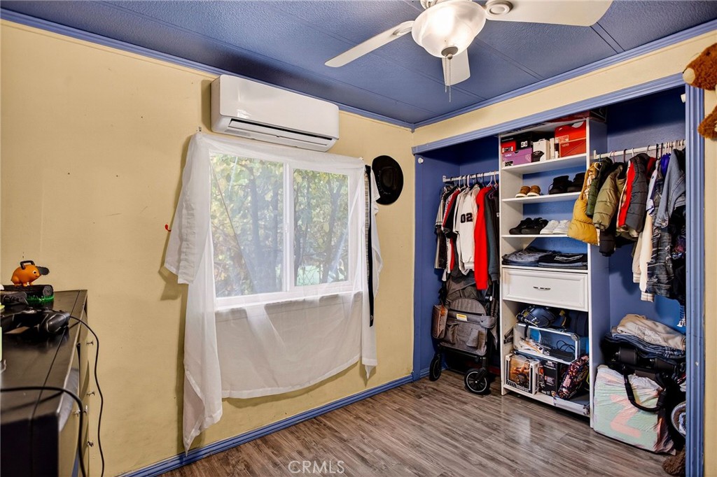 3156 Esplanade, Unit 292 Chico, CA 95973 - Photo 26 of 44 a view of walk in closet with clothes and shoes