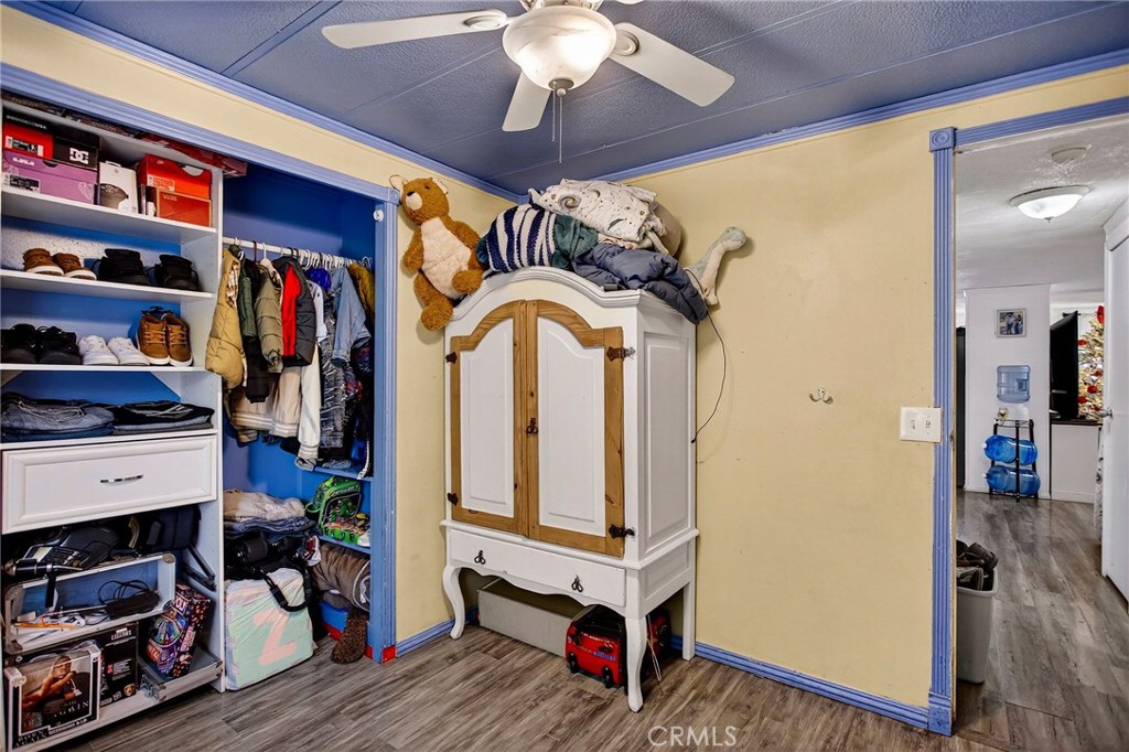 3156 Esplanade, Unit 292 Chico, CA 95973 - Photo 27 of 44 a view of walk in closet with clothes and shoes