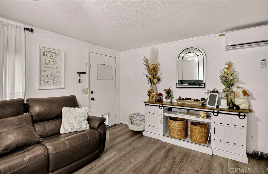 3156 Esplanade, Unit 292 Chico, CA 95973 - Photo 10 of 44 a living room with furniture and wooden floor