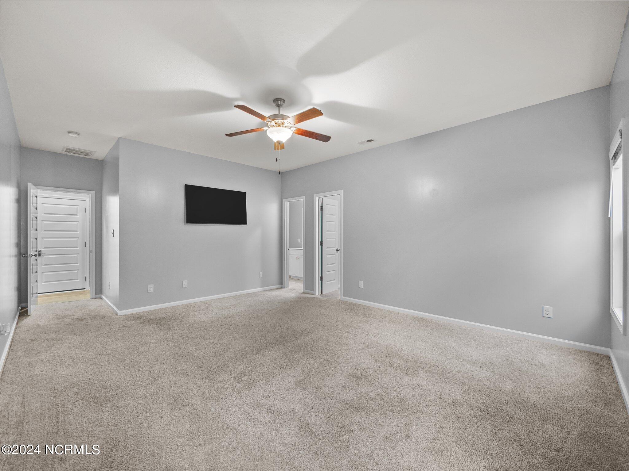 309 South Windy Ridge Road Hubert, NC 28539 - Photo 21 of 52 Primary Bedroom