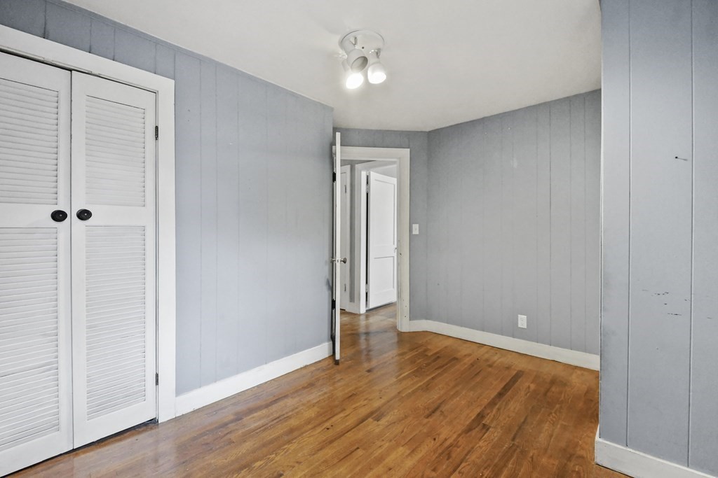 40 New Boston Road Sturbridge, MA 01566 - Photo 14 of 36 wooden floor in an empty room with a window