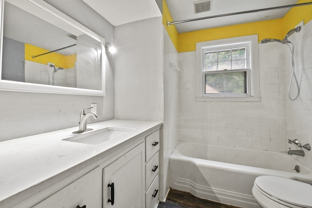 40 New Boston Road Sturbridge, MA 01566 - Photo 20 of 36 a bathroom with a granite countertop sink toilet and shower