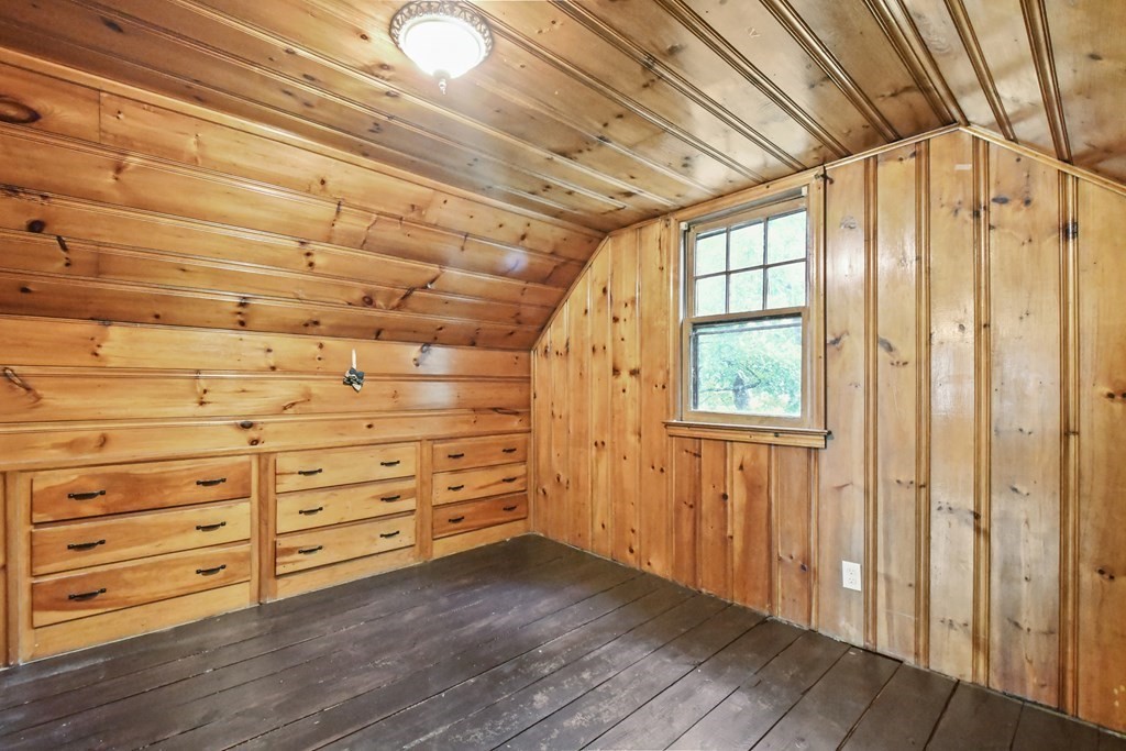 40 New Boston Road Sturbridge, MA 01566 - Photo 24 of 36 a view of an empty room with wooden floor and walls