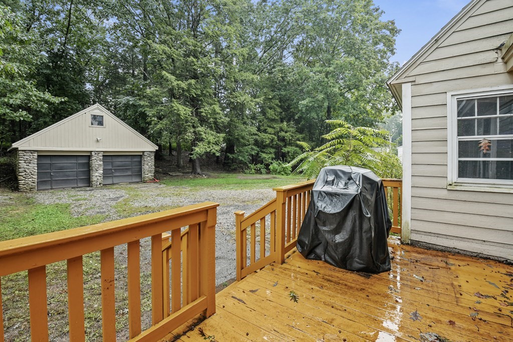 40 New Boston Road Sturbridge, MA 01566 - Photo 34 of 36 a view of a wooden deck and a yard