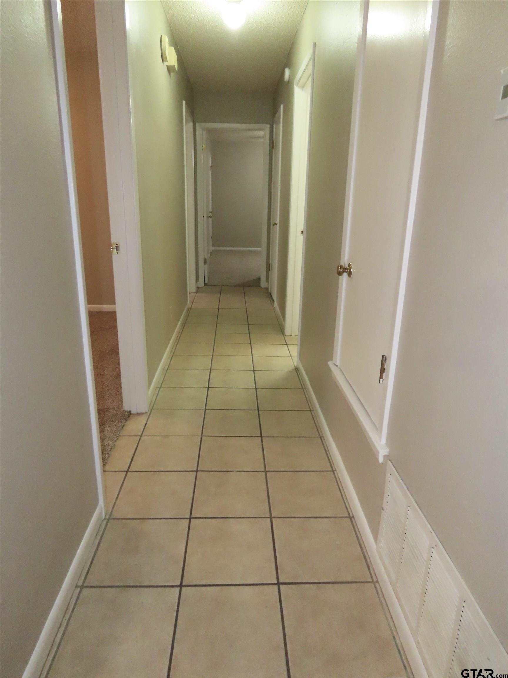 402 Muller Garden Road Tyler, TX 75703 - Photo 14 of 33 a view of a hallway