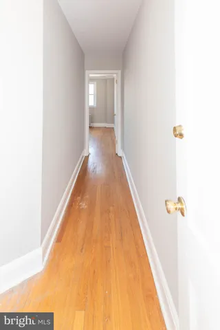 a view of a swimming pool with a hallway