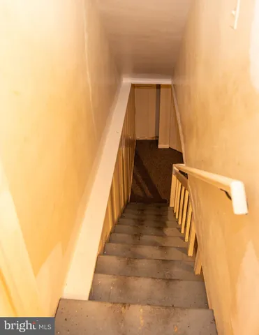 a bathroom with a toilet and a sink