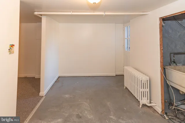 a view of a hallway with staircase