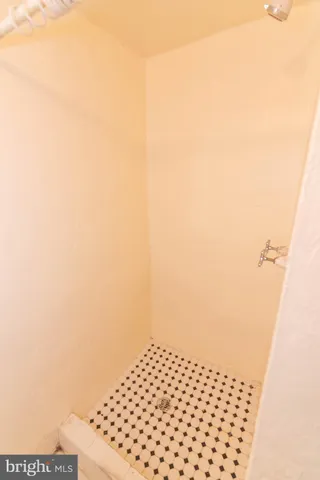 a view of a swimming pool with a patio and swimming pool