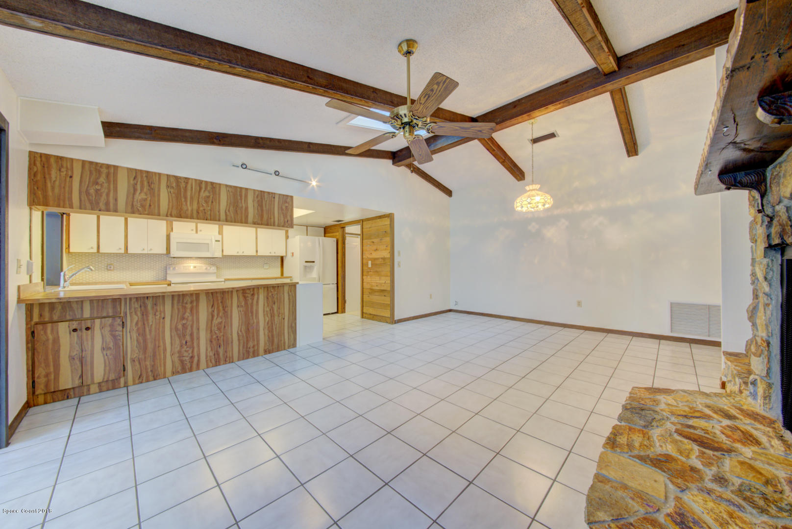4660 Rector Road Cocoa, FL 32926 - Photo 14 of 56 family room open to kitchen