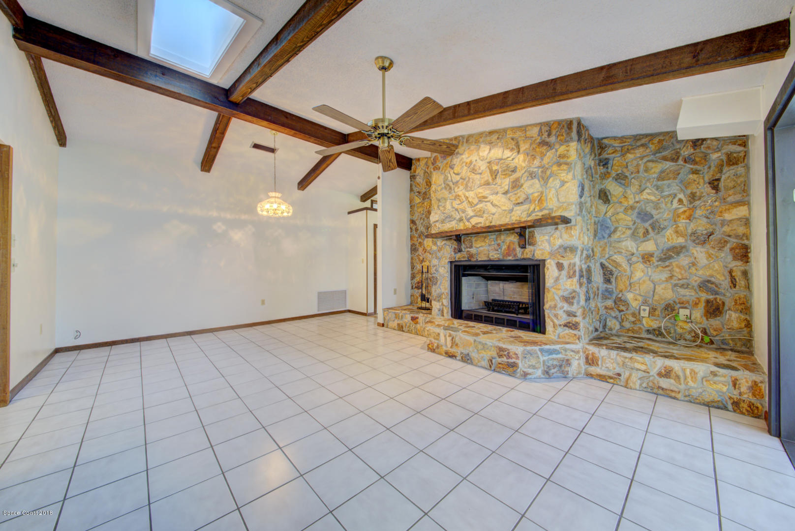 4660 Rector Road Cocoa, FL 32926 - Photo 15 of 56 family room with fireplace