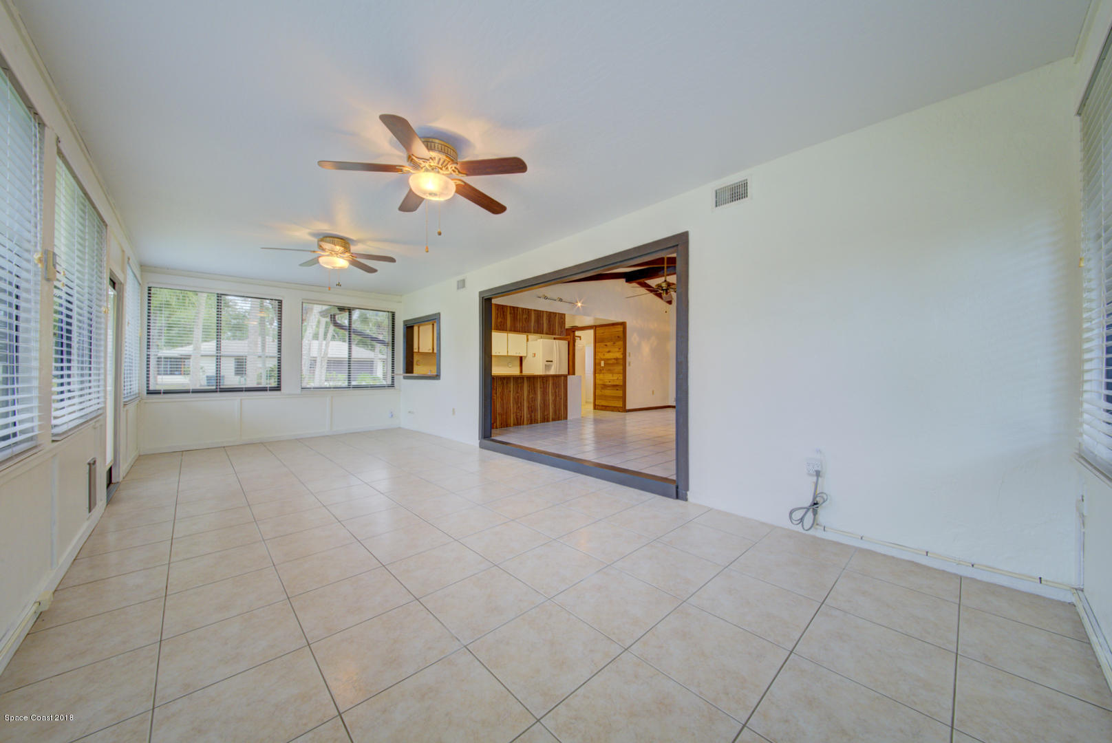 4660 Rector Road Cocoa, FL 32926 - Photo 17 of 56 Florida room with tile floor