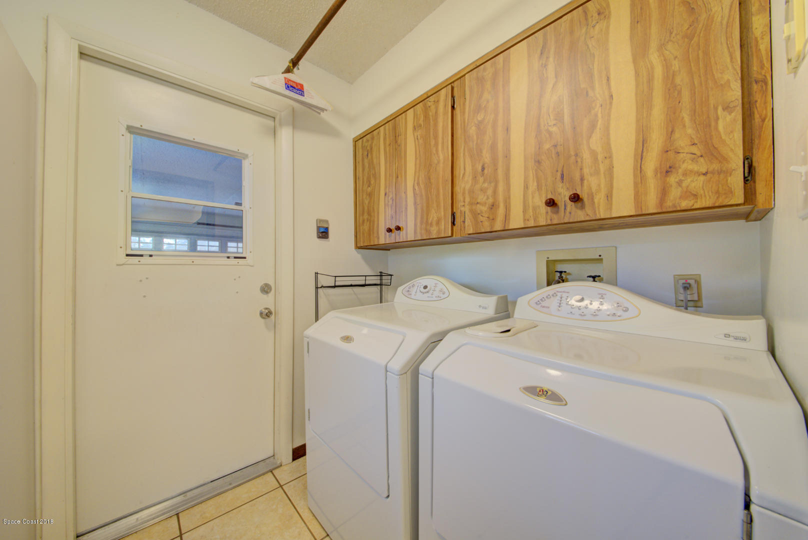 4660 Rector Road Cocoa, FL 32926 - Photo 45 of 56 laundry room and garage access