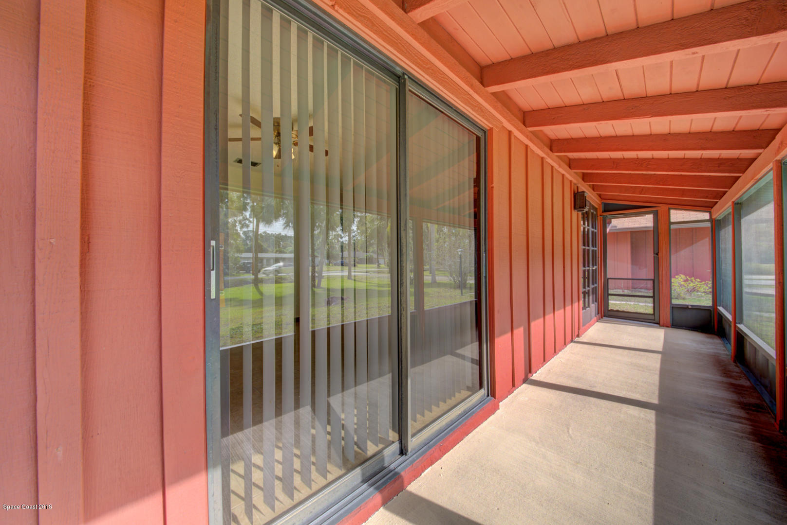 4660 Rector Road Cocoa, FL 32926 - Photo 46 of 56 front porch with access to bedrooms 2 &
