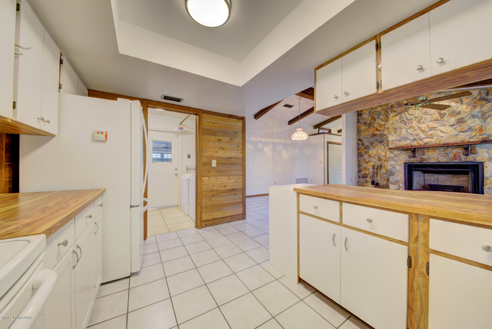 4660 Rector Road Cocoa, FL 32926 - Photo 9 of 56 kitchen with access to laundry room