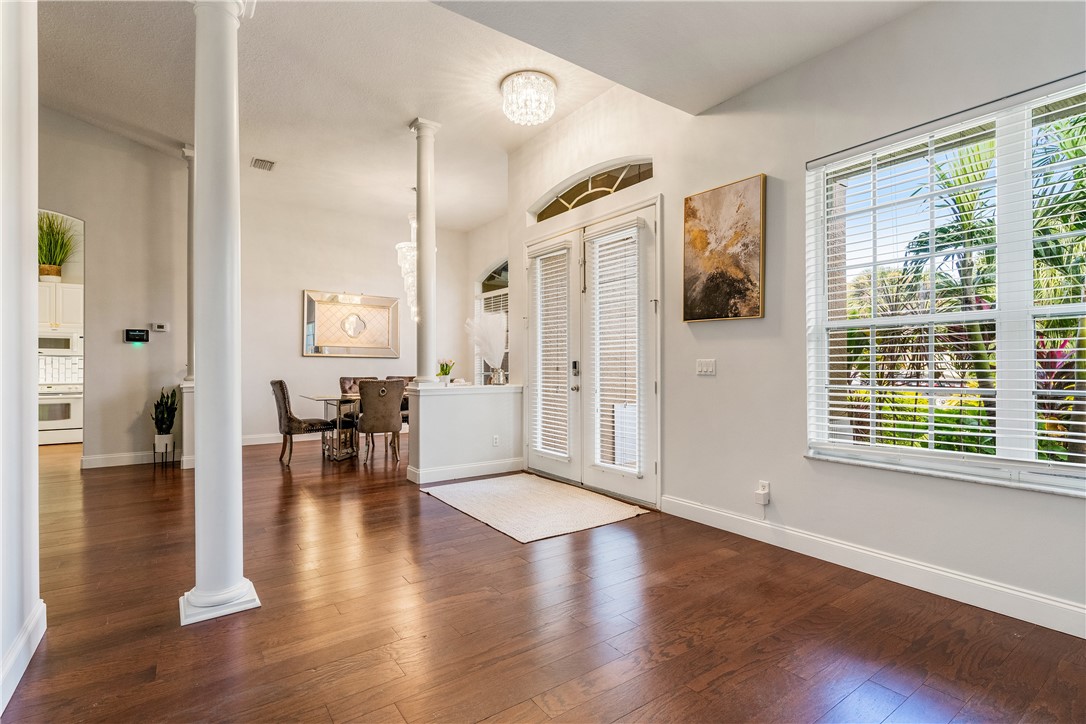 6425 33rd Lane Vero Beach, FL 32966 - Photo 10 of 29 a view of a livingroom with furniture and hardwood floor