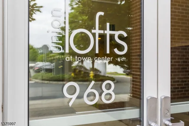 view of a door of a house with washer and dryer