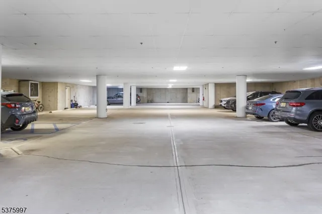 a view of a livingroom with furniture car and window