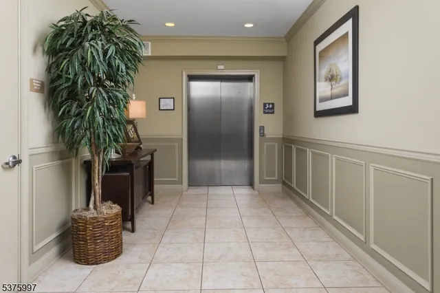 a view of entryway with livingroom and hallway