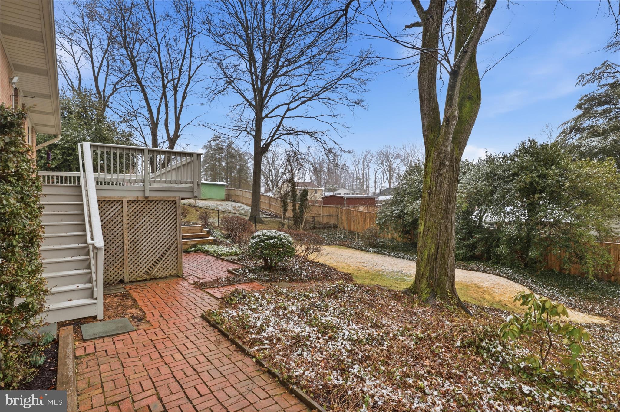 7921 Ellet Road Springfield, VA 22151 - Photo 32 of 44 Backyard with Brick Path and Stairs to Deck