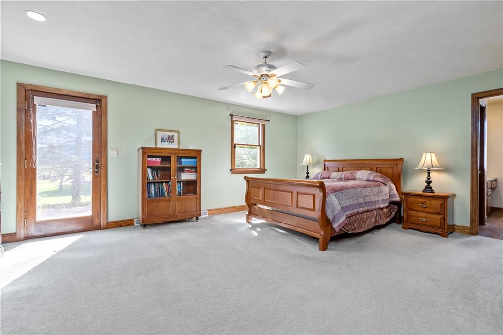 61 Meyers Road Washington, PA 15301 - Photo 14 of 23 a bedroom with a bed and a chandelier