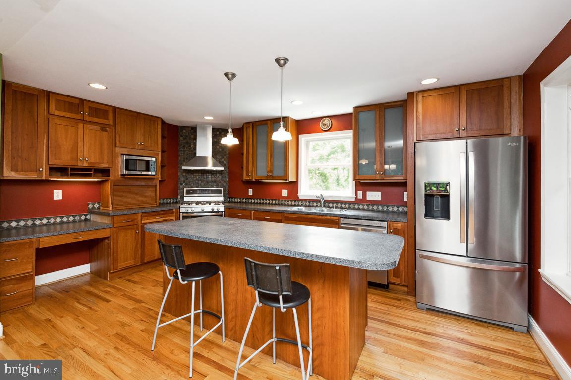 1813 Fairbank Road Baltimore, MD 21209 - Photo 22 of 65 Kitchen offers pendant lighting, pantry, desk area