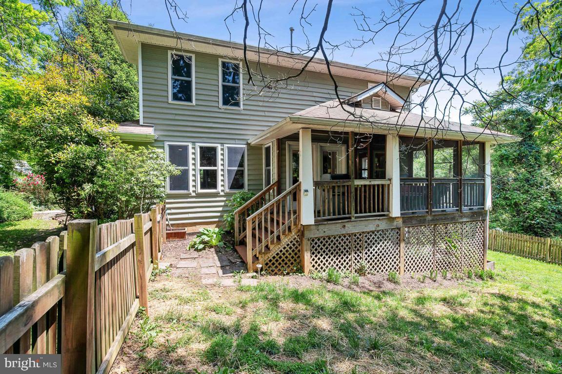 1813 Fairbank Road Baltimore, MD 21209 - Photo 60 of 65 View of side deck and screened porch