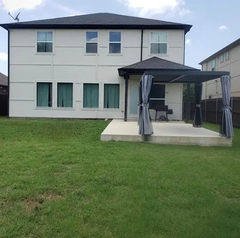 a view of living room and kitchen with furniture