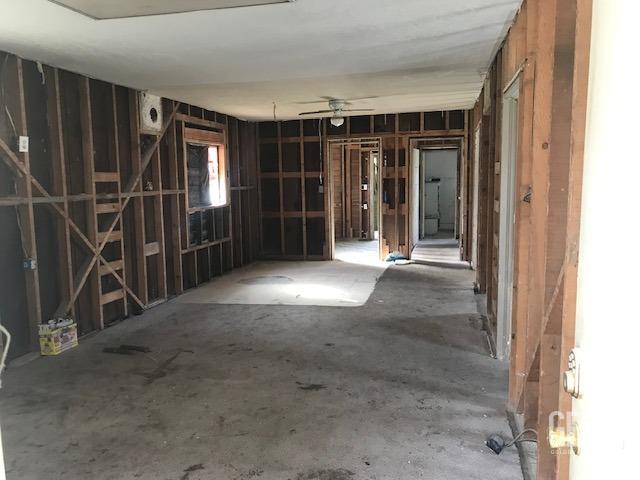 Undisclosed Address Wasco, CA 93280 - Photo 4 of 10 a view of empty room with windows