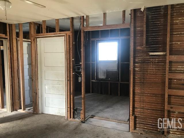 Undisclosed Address Wasco, CA 93280 - Photo 6 of 10 a view of a house with a door and chair