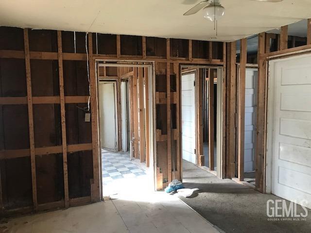 Undisclosed Address Wasco, CA 93280 - Photo 7 of 10 a view of a house with a door and wooden floor