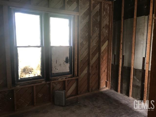 Undisclosed Address Wasco, CA 93280 - Photo 8 of 10 a view of an empty room and window