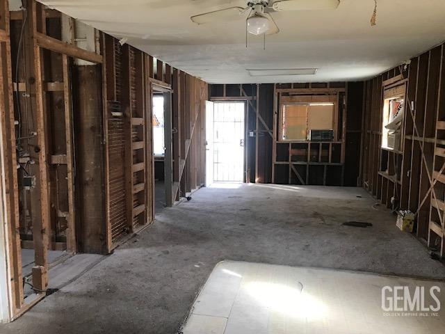 Undisclosed Address Wasco, CA 93280 - Photo 9 of 10 a view of livingroom with hallway