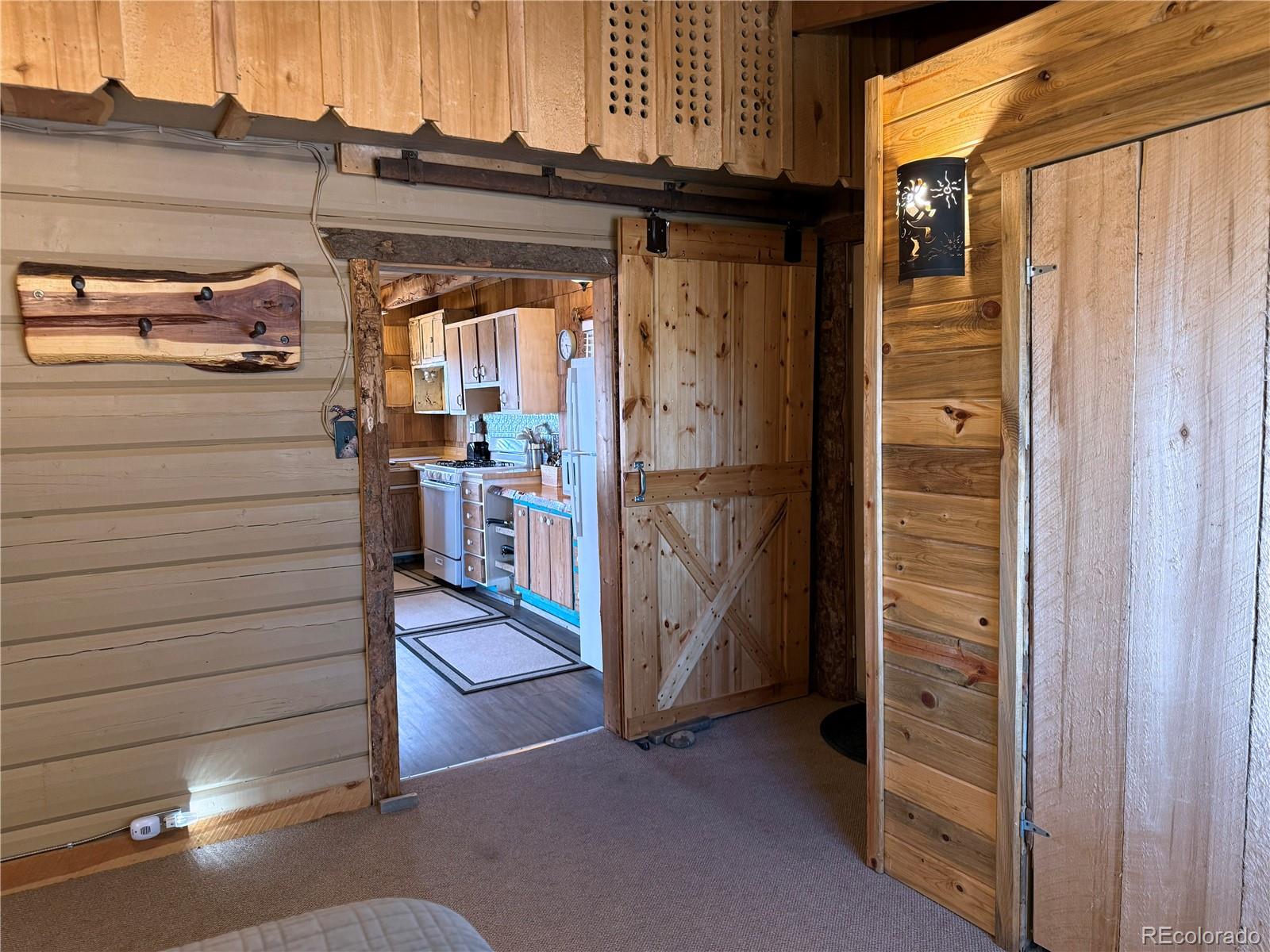 6132 Running Horse Road San Luis, CO 81152 - Photo 16 of 45 a view of storage and utility room
