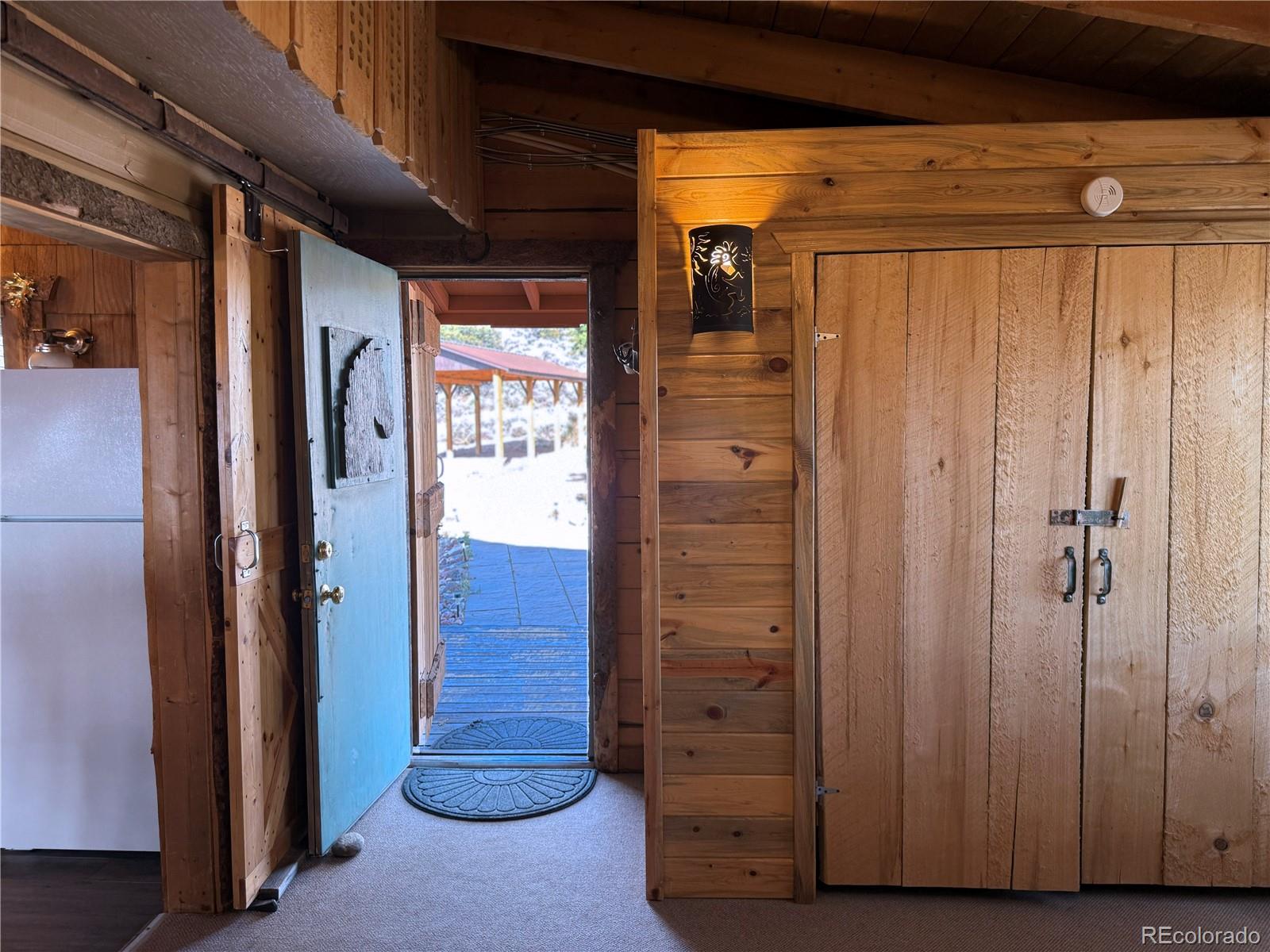 6132 Running Horse Road San Luis, CO 81152 - Photo 19 of 45 a view of a hallway with closet