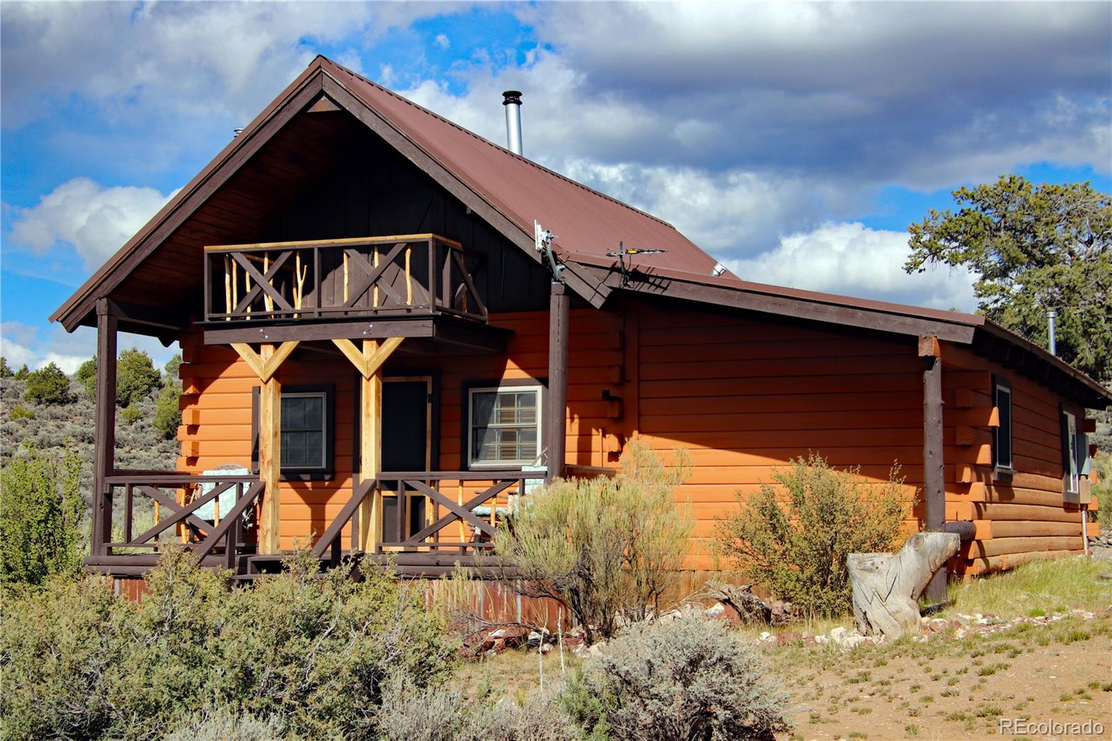 6132 Running Horse Road San Luis, CO 81152 - Photo 3 of 45 front view of a house with a yard