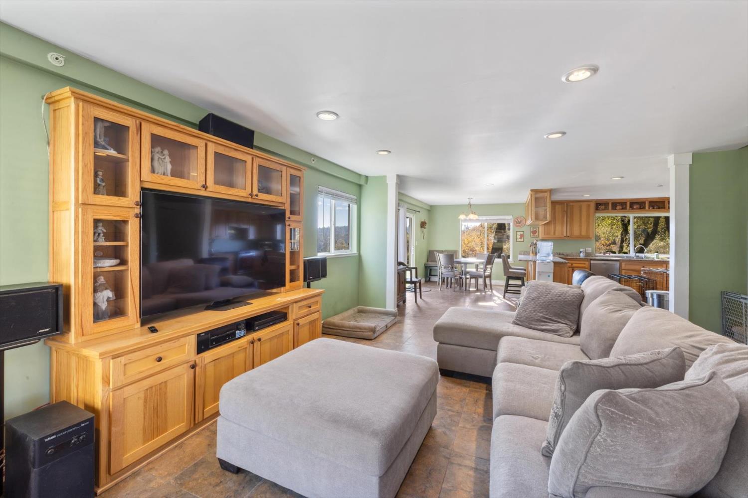 2870 Sand Ridge Road Placerville, CA 95667 - Photo 11 of 91 a living room with furniture and a flat screen tv